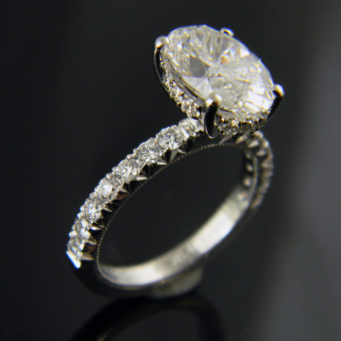 Oval Diamond Engagement Ring with Hidden Halo and Diamond Band