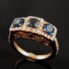 Handmade Ring with Three London Blue Topaz Surround by Diamonds in 14k Rose Gold